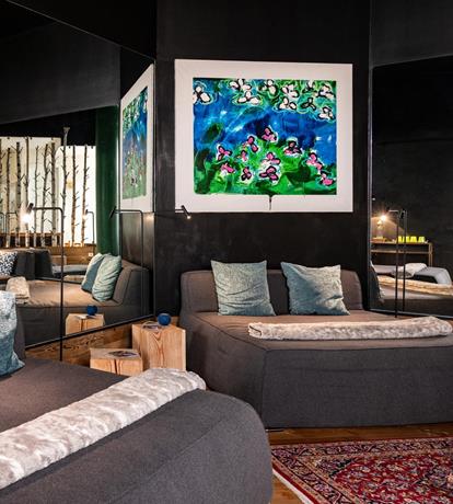 Zona relax wellness con chaise longue – Sport Hotel Panorama, Fai della Paganella